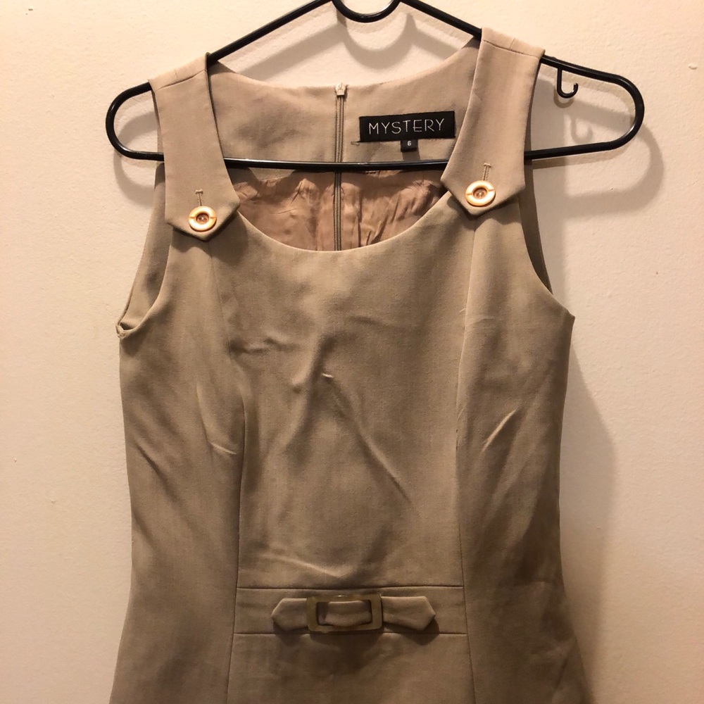 Retro tan blouse; adds character to your wardrobe.